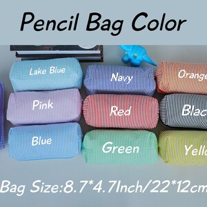 May include: A collection of colorful pencil bags in various colors, including purple, lake blue, navy, orange, pink, red, black, blue, green, and yellow. Each bag is striped and labeled with its color. The bag size is 8.7*4.7 inches.