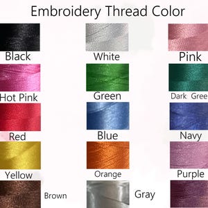 May include: Image showing a color chart of embroidery thread. The chart displays swatches of various thread colors, including black, white, pink, hot pink, green, dark green, red, blue, navy, yellow, orange, purple, brown, gray, and dark purple.