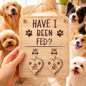 May include: A rectangular wooden pet feeding tracker sign with a rope hanger. The text reads HAVE I BEEN FED? with AM and PM labels above two heart-shaped wooden tags labeled YES and NO, each suspended by a small rope through the main board.