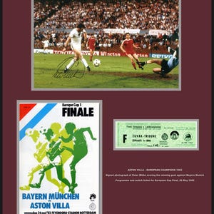 May include: A signed photograph of a footballer scoring a goal, a programme for the 1982 European Cup Final, and a ticket for the game. The programme features a green and yellow illustration of two footballers. The ticket is green and white with the text "ZUVAK-TRIBUNE" and "PRUS 40."
