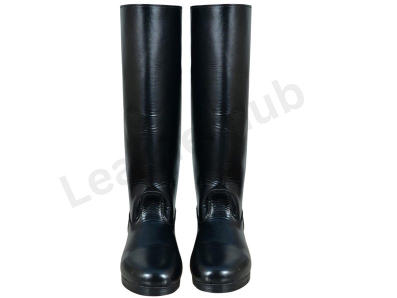 May include: A pair of tall, black riding boots. The boots are made of a shiny material and have a smooth, sleek appearance. They are designed to reach the mid-calf and have a classic equestrian style.