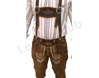 May include: Brown leather lederhosen with gold embroidery and suspenders. The suspenders have a brown leather strap with a gold buckle.