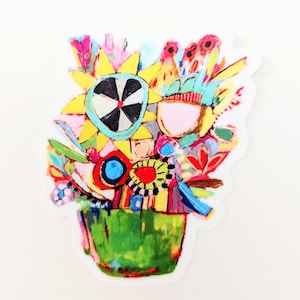 May include: A colorful bouquet of flowers in a green pot. The flowers are painted in a whimsical style with bright colors and bold lines. The flowers include sunflowers, daisies, and other blooms.