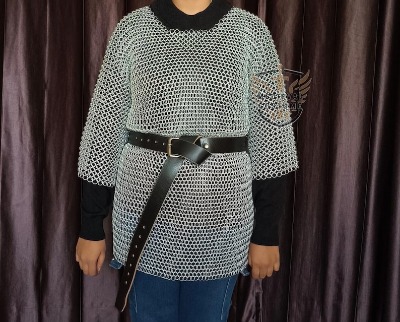 Side profile of a short sleeve chain mail hauberk showing the fit and armhole construction.