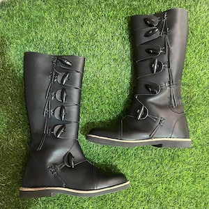 Brown handmade medieval leather long boots with buckle and lace details, historic Renaissance festival footwear