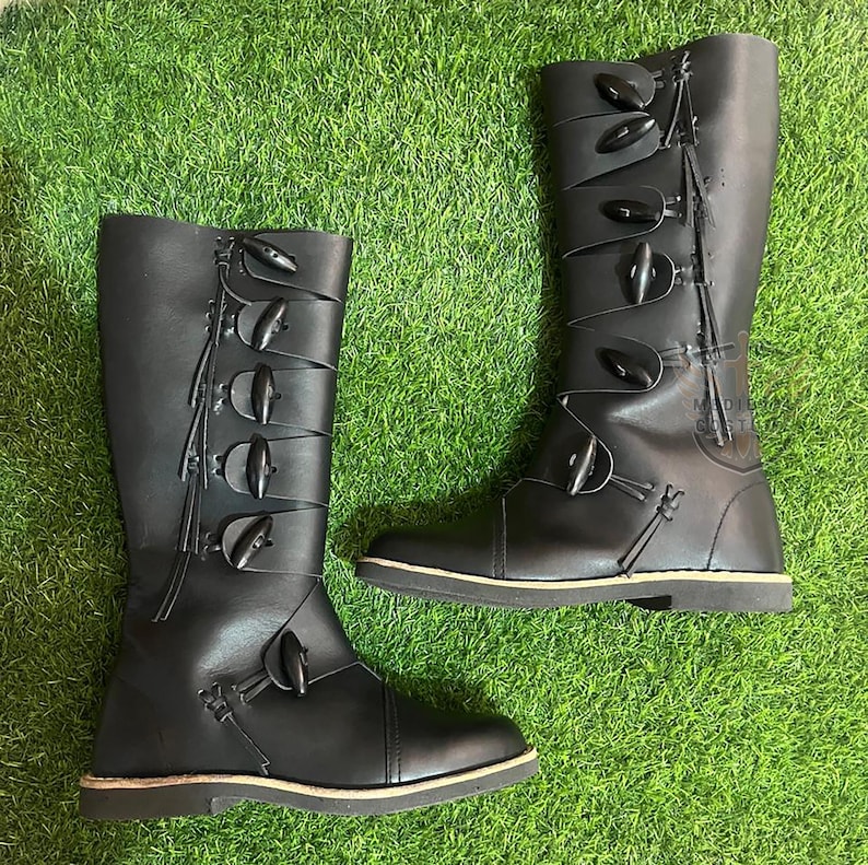 Side profile of brown leather medieval boots with buckle accents and high shaft for Renaissance costumes