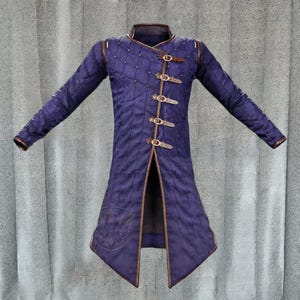 Blue handmade cotton padded gambeson jacket with leather straps for medieval reenactment costume