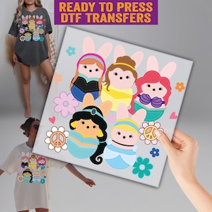May include: A set of six iron-on transfers featuring Disney Princesses dressed as Easter bunnies. The princesses are Snow White, Cinderella, Ariel, Belle, Jasmine, and Mulan. The transfers are ready to press and are perfect for adding a touch of Disney magic to your crafts.