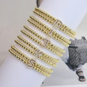 Pulsera de cuentas dobles con 26 letras de circonita de cristal