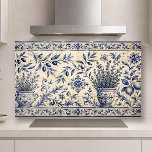 May include: A rectangular kitchen splashback mural composed of square tiles featuring a blue and white botanical pattern. The design displays potted herbs, olive branches, and lemon motifs with intricate scrolling borders on a cream background.