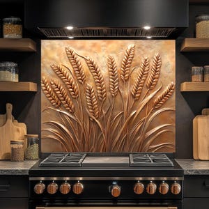 May include: A bronze relief artwork of wheat stalks above a black cooker with copper-toned controls. The kitchen setting features wooden shelves with jars and chopping boards. The artwork is mounted on the wall.