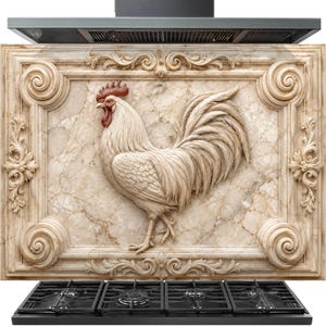 May include: A rectangular kitchen splashback panel featuring a relief sculpture of a rooster in the centre, set against a beige marble-patterned background. The panel is framed by ornate scrollwork and sits above a black four-burner gas hob.