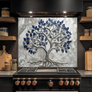 May include: A kitchen backsplash featuring a 3D tree design with a marble background. The tree has a silver trunk and branches with blue leaves. The backsplash is installed above a black stove with copper-colored knobs.