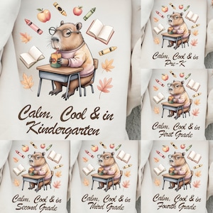 May include: A white t-shirt featuring a capybara wearing glasses and a sweater, sitting at a desk with a juice box. The text "Calm, Cool & in Kindergarten" is below the image, with crayons, apples, and books.