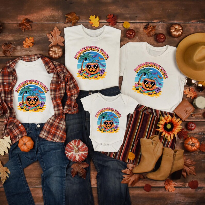 May include: A collection of white t-shirts and a baby onesie with a "Summerween Vibes" graphic featuring a pumpkin wearing sunglasses on a beach. The image includes jeans, a plaid shirt, boots, and fall-themed decorations.