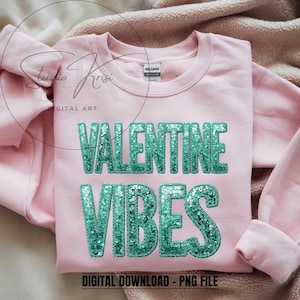 May include: A light pink sweatshirt with the words "VALENTINE VIBES" in large, teal sequined letters. The sweatshirt is a digital download in PNG file format. The design is centered on the front of the garment.
