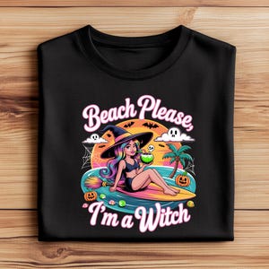 May include: Black t-shirt with a cartoon witch on a surfboard, text reads "Beach Please, I'm a Witch." The witch wears a black hat and bikini, holding a green drink. Design includes pumpkins, a palm tree, and a sunset.