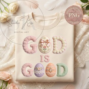 May include: A cream-coloured sweatshirt featuring the phrase "GOD IS GOOD" in pastel appliqued letters and Easter egg designs. The colours include pink, white, purple, orange, and green. Digital download.