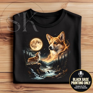May include: Black t-shirt featuring a detailed illustration of a Corgi dog under a full moon. The design includes a howling Corgi, a river, and a forest. The text "BLACK BASE PRINTING ONLY" is also visible.
