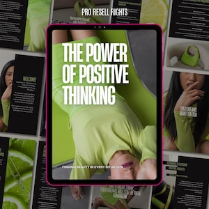 May include: A digital tablet displaying a green and black graphic with the text "The Power of Positive Thinking" and "Finding Beauty in Every Situation". The tablet is lying on a green yoga mat with a woman wearing a green and white outfit lying on top of it.