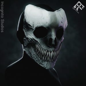以下が含まれることがあります： 鋭い歯と大きな眼窩を持つ、詳細なグレースケールのスカルマスク。 マスクは暗い人物に着用されており、左側に「Incognito Studios」のテキスト、右側にロゴが表示されています。