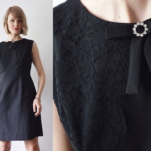 Vintage 60s mod black mini dress with lace and bow detail. sleeveless a line shift party cocktail dress - medium