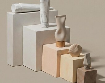 Pedestales de exhibición arquitectónicos: bloques modulares de hormigón y yeso para tiendas de lujo
