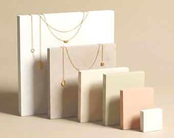 Display risers in different heights for jewelry presentation, product styling and boutique displays