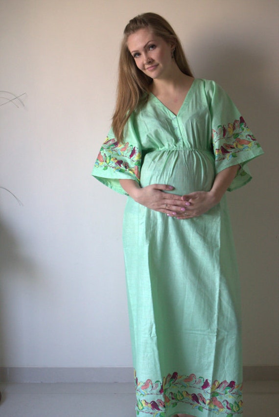 green emerald velvet dress Angel Maternity Annabella Knit Maternity Midi Dress in Sage Green main image 0