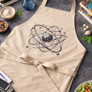 Tablier atomique : cadeau scientifique en coton biologique pour professeur de STIM