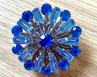 Fabulous 1930's Blue Starburst brooch with safety chain.