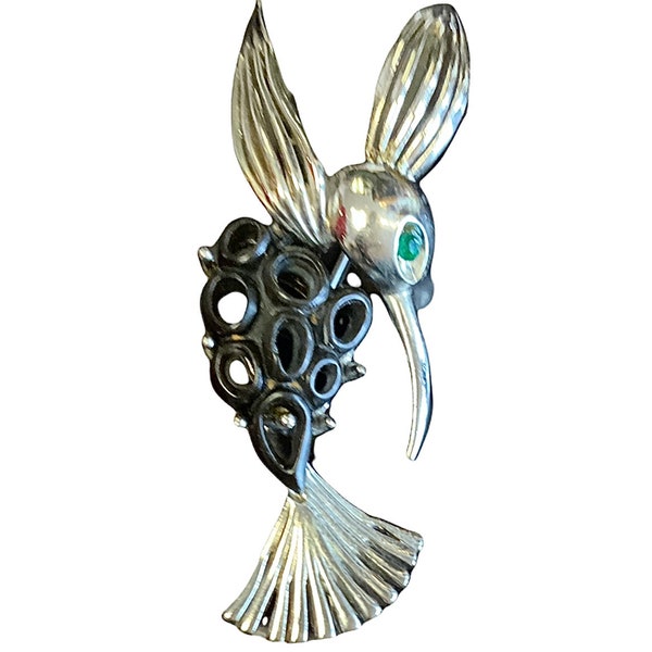 1960’s humming bird brooch In silver tone metal