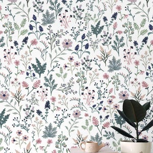 Floral light wallpaper in pastel, green, pink and neutral called &#39;Bluma.&#39; Floral style design for dining room, lounge, bedroom + home decor