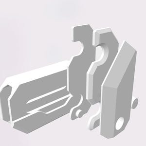 May include: A white plastic key with a unique design featuring multiple interlocking pieces. The key has a rectangular shape with a rounded edge and a small hole on the side.