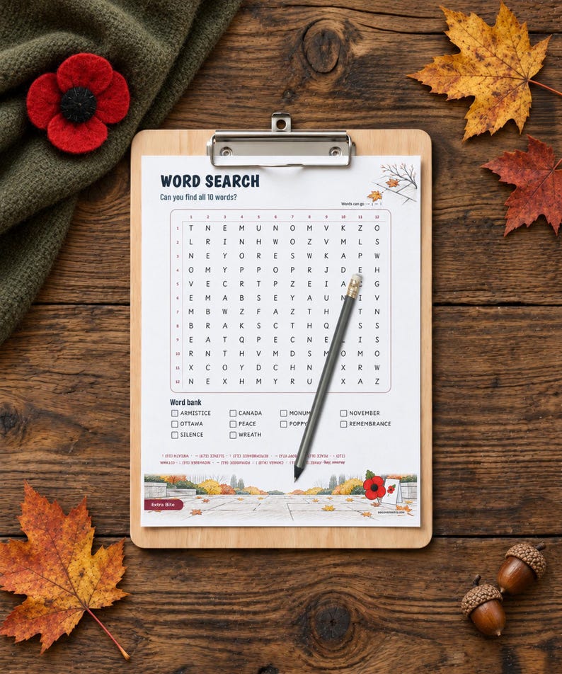 May include: A word search puzzle sheet on a wooden clipboard with a pencil resting on the grid. The sheet features the title WORD SEARCH, a letter grid, a word bank with terms like Armistice and Poppy, and a bottom illustration of a memorial.