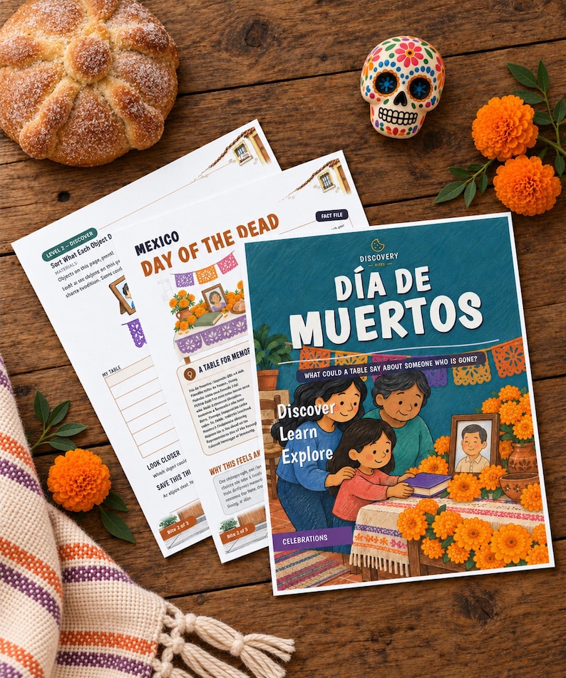 May include: A set of educational activity sheets titled D&iacute;a de Muertos, featuring illustrations of a family at an altar, alongside a round bread, a decorative skull, and orange marigold flowers on a wooden surface.