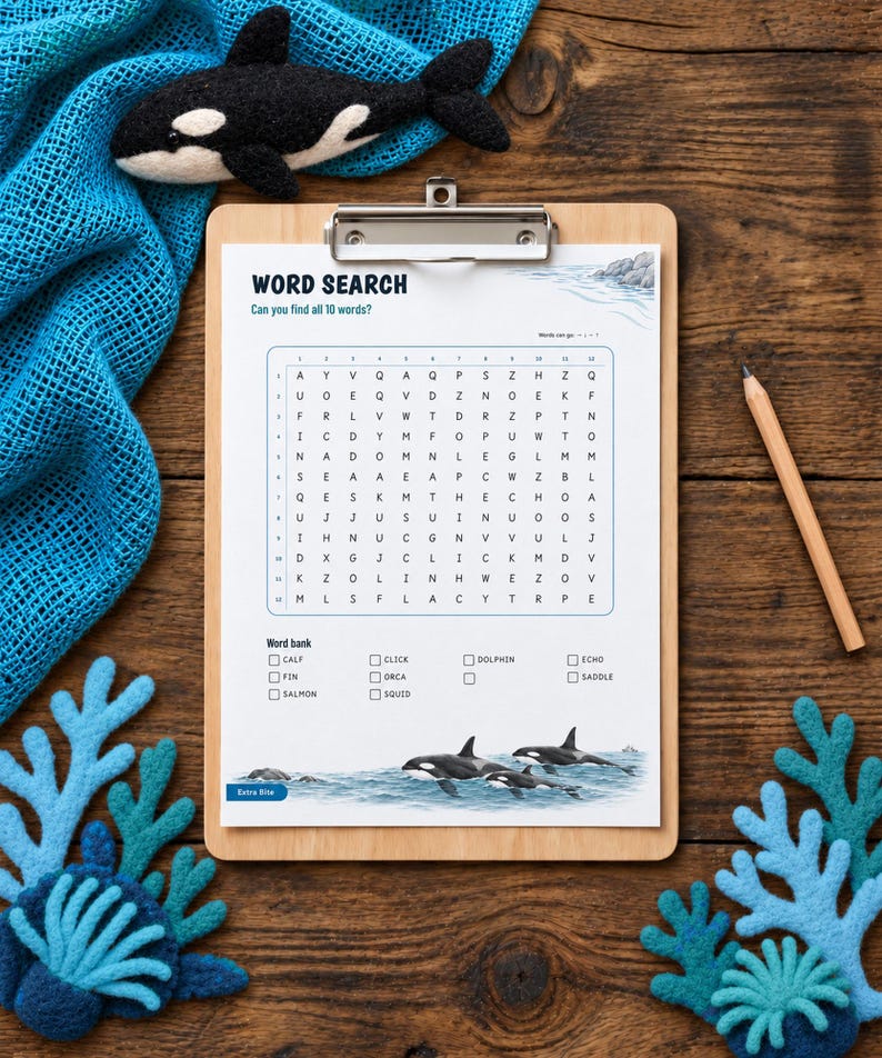 May include: A word search puzzle sheet on a wooden clipboard featuring a grid of letters, a word bank, and illustrations of orcas. The sheet includes the text WORD SEARCH, Can you find all 10 words?, and a list of words including calf, fin, salmon, click, orca, squid, dolphin, echo, and saddle.