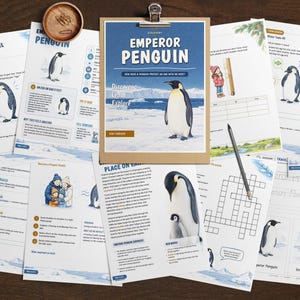 May include: A collection of educational activity sheets about Emperor Penguins, featuring illustrations of penguins in icy habitats, word searches, crossword puzzles, and informational text. A wooden clipboard holds the main cover page.