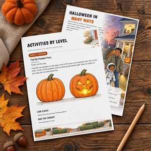 May include: Two printed activity sheets titled Halloween in Many Ways and Activities by Level, featuring illustrations of pumpkins, a child in an astronaut costume, and a house. The sheets are placed on a wooden surface with a felt pumpkin.