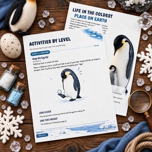 May include: Two educational activity sheets titled Activities by Level and Life in the Coldest Place on Earth, featuring emperor penguin illustrations, text, and instructions for a game called Keep the Egg Up, surrounded by a felt penguin, glass beads, and a magnifying glass.