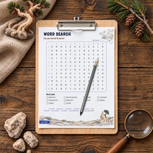 May include: A word search puzzle sheet on a wooden clipboard with a pencil resting diagonally across the grid. The sheet features the title WORD SEARCH, a 12 by 12 letter grid, a word bank, and illustrations of a mountain landscape.