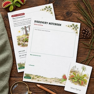 May include: Two white educational worksheets titled Discovery Notebook and What If Shrubs Move In, a small Venus Flytrap card, a magnifying glass, a wooden pencil, and a small felt Venus Flytrap toy on a dark wooden surface.