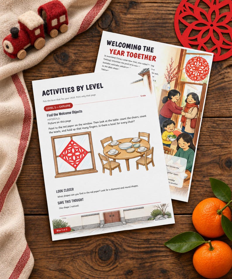 May include: Two printed activity sheets titled Welcoming the Year Together and Activities by Level, featuring illustrations of a red paper window decoration, a dining table with bowls, and a family scene, alongside a felt train and two oranges.