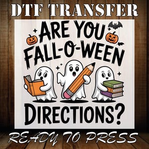 May include: A Halloween-themed DTF transfer design featuring the text "ARE YOU FALL-O-WEEN DIRECTIONS?" with three cartoon ghosts, pumpkins, and a bat. One ghost holds a book, another a pencil, and the third holds books.