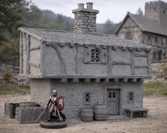May include: A miniature gray stone house with a chimney, wooden beams, and a shingled roof. A miniature knight with a sword and shield stands in front of the house. Two wooden barrels and a bench are also in front of the house.