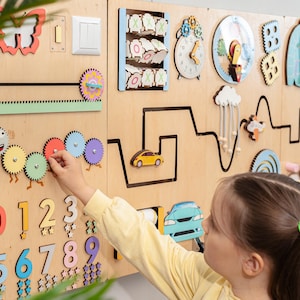Educational Wall Toy with lights for Early Learning and Development Durable Kids sensory wall Busy Board