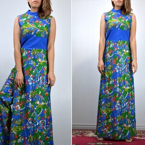May include: A long, sleeveless dress with a colourful floral print in blue, green, and red. The dress has a high neckline and a solid blue band at the waist. The fabric looks lightweight, ideal for warmer weather. The dress is floor-length.