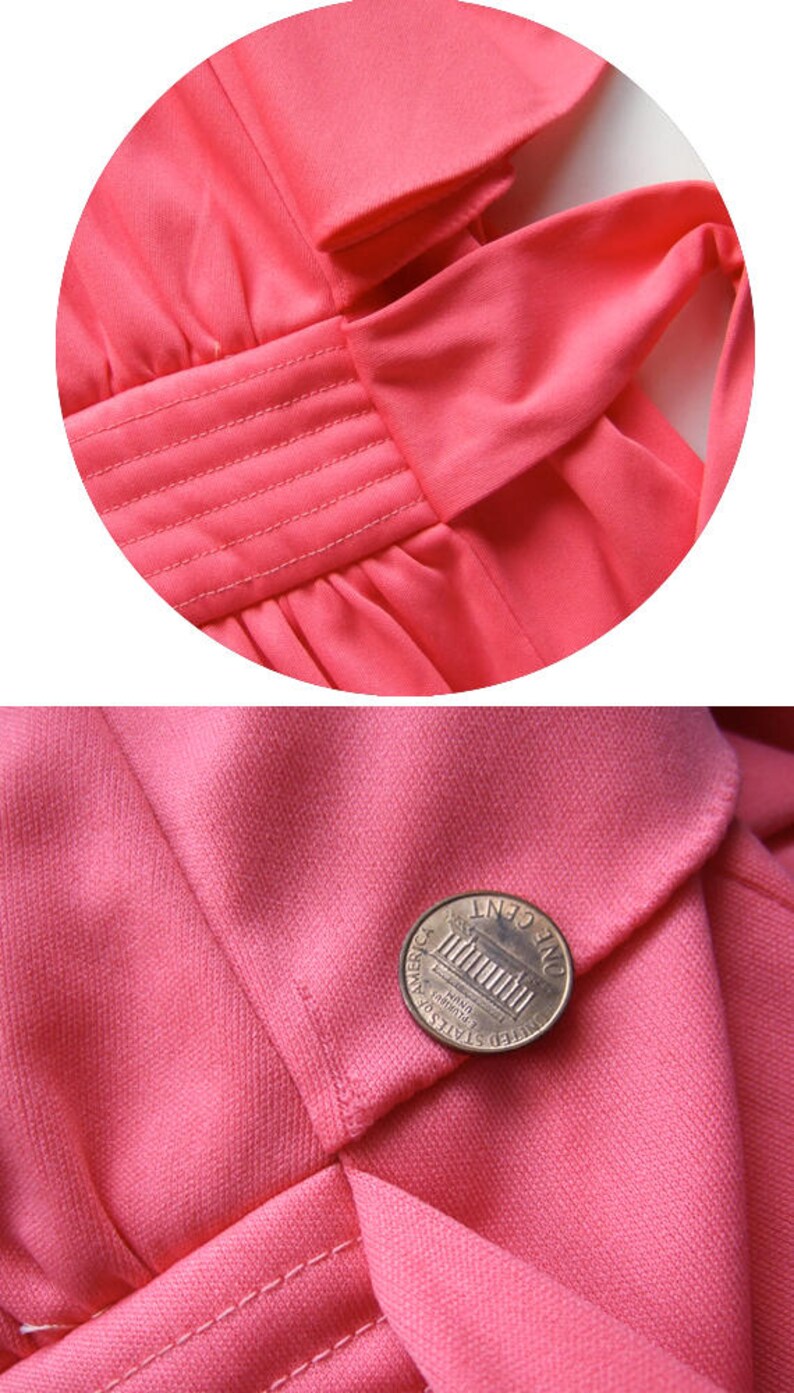 May include: Close-up of a coral-coloured garment, possibly a dress or top, with detailed stitching and a bow. A penny is placed on the fabric for scale, highlighting the texture and colour.