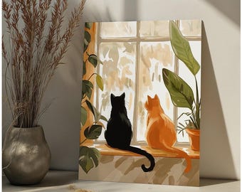 Puede incluir: Dos gatos, uno negro y otro naranja, se sientan uno al lado del otro en un alféizar de la ventana mirando hacia afuera por una ventana. La ventana está enmarcada en blanco y tiene una vista de un paisaje nevado. Una planta verde está en una maceta en el alféizar de la ventana.