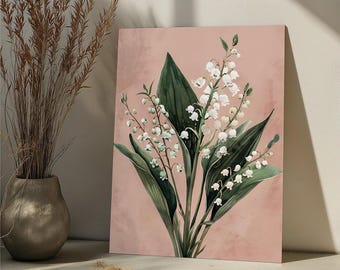 Puede incluir: Un fondo rosa con un ramo de flores blancas de lirio de los valles con hojas verdes.